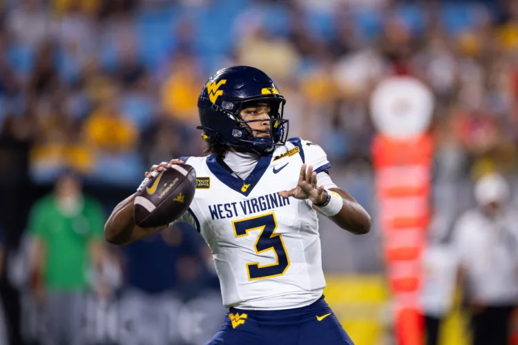 West Virginia's terrible defense and productive offense add up to four straight 1,000-yard games